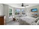 Bedroom showcasing a large bay window offering natural light and a scenic view at 7108 229Th E St, Bradenton, FL 34211