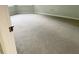 Empty bedroom featuring neutral carpet and base molding, ready for personalization at 7108 229Th E St, Bradenton, FL 34211