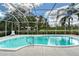 Relaxing screen enclosed pool area with outdoor views at 7108 229Th E St, Bradenton, FL 34211
