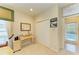 Bright bedroom featuring a work station, closet, and view of the pool area at 8124 115Th E Ave, Parrish, FL 34219