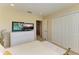 Cozy bedroom with a view into a bookcase filled hallway, featuring white furniture at 8124 115Th E Ave, Parrish, FL 34219