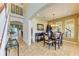Charming dining area with a view into the entryway and staircase at 8124 115Th E Ave, Parrish, FL 34219