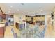 Dining room situated between the kitchen and living room, with an elegant dining table at 8124 115Th E Ave, Parrish, FL 34219