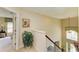 Hallway with staircase that leads to the lower level at 8124 115Th E Ave, Parrish, FL 34219