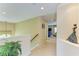 Open hallway with staircase that leads to a living room at 8124 115Th E Ave, Parrish, FL 34219