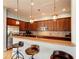 Modern kitchen with granite counters, stainless steel appliances, and breakfast bar seating at 8124 115Th E Ave, Parrish, FL 34219