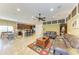 Open-concept living space featuring a modern kitchen and a comfortable seating area at 8124 115Th E Ave, Parrish, FL 34219