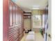 A spacious walk-in closet boasts custom storage, and an organization system at 8124 115Th E Ave, Parrish, FL 34219