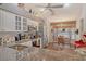 Modern kitchen features stainless steel appliances, granite countertops and a breakfast nook with natural light at 8951 Veranda Way # 621, Sarasota, FL 34238