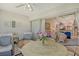 Enclosed patio with ceiling fan and sliding glass doors leading to a living space, perfect for relaxing or entertaining guests at 8951 Veranda Way # 621, Sarasota, FL 34238