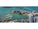 Beautiful aerial view featuring the waterfront, cityscape, boats, and luxury apartments at 100 Central Ave # C521, Sarasota, FL 34236