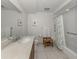 Bathroom featuring a walk-in shower, toilet, and vanity with a large mirror at 100 Central Ave # C521, Sarasota, FL 34236