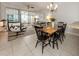 Well-lit living and dining space, complemented by an adjacent balcony offering outdoor views at 100 Central Ave # C521, Sarasota, FL 34236