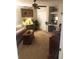 Cozy bedroom featuring a decorative vanity, closet and ceiling fan at 10157 Sunburst Ct, Spring Hill, FL 34608