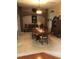 Elegant dining room with hardwood floors, traditional furniture, and neutral paint at 10157 Sunburst Ct, Spring Hill, FL 34608