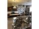 Inviting kitchen with granite countertops, stainless steel appliances, and an open dining area at 10157 Sunburst Ct, Spring Hill, FL 34608
