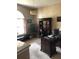 Elegant office space featuring built-in bookcase, with natural light and views at 10157 Sunburst Ct, Spring Hill, FL 34608