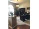 Dedicated office space with custom built in desk, hardwood flooring, and natural light at 10157 Sunburst Ct, Spring Hill, FL 34608