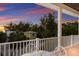 Charming balcony with a glass table and sunset views at 112 50Th St, Holmes Beach, FL 34217