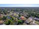 Aerial view showing neighborhood layout, streets, waterways, and houses from above at 1224 Inverness St, Port Charlotte, FL 33952