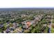 Sprawling neighborhood featuring single-Gathering homes surrounded by lush greenery and waterways at 1224 Inverness St, Port Charlotte, FL 33952