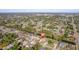 Overhead shot of houses near water with thick surrounding forest and residential streets at 1224 Inverness St, Port Charlotte, FL 33952