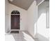 Inviting front entrance featuring tile flooring, and modern accents at 1224 Inverness St, Port Charlotte, FL 33952