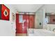 Bathroom with tiled shower, modern vanity, and unique architectural details at 1354 Westway Dr, Sarasota, FL 34236