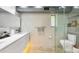 Modern bathroom featuring a sleek vanity, glass shower, and neutral color palette at 1354 Westway Dr, Sarasota, FL 34236