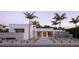 Striking modern home with lush landscaping, clean architectural lines, and enhanced curb appeal at 1354 Westway Dr, Sarasota, FL 34236