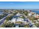 Modern home featuring sleek lines, a well-manicured landscape, and views of the ocean for a luxurious living experience at 1354 Westway Dr, Sarasota, FL 34236