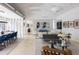 Spacious living room with modern furnishings, artwork, and seamless flow to the dining area at 1354 Westway Dr, Sarasota, FL 34236
