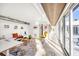 Bright living room with modern furniture and sliding glass doors with a view at 1354 Westway Dr, Sarasota, FL 34236