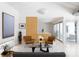 Bright, airy living room featuring vaulted ceilings and seamless flow to kitchen and outdoor spaces at 1354 Westway Dr, Sarasota, FL 34236