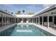 Relaxing pool with comfortable lounge chairs and view of the home at 1354 Westway Dr, Sarasota, FL 34236