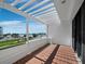 Outdoor balcony featuring tiled floor and great views of the blue water at 1485 Gulf Of Mexico Dr # 205, Longboat Key, FL 34228