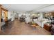 Expansive living area with a modern kitchen and multiple seating arrangements at 1485 Gulf Of Mexico Dr # 205, Longboat Key, FL 34228