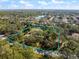 Aerial view of a home on 2.06 acres outlined with property lines in a serene and private setting at 201 Eaglenook Way, Osprey, FL 34229