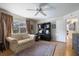 Bedroom with ceiling fan, window, and a light-filled interior at 201 Eaglenook Way, Osprey, FL 34229