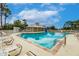Spend time at this inviting community pool with an adjacent pool house at 2123 Lynx Run, North Port, FL 34288