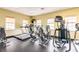 Fitness center features treadmills, ellipticals and stationary bikes providing multiple options for a complete workout at 2123 Lynx Run, North Port, FL 34288