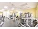 Well-equipped gym featuring weight machines and mirror providing a dedicated space for residents to maintain an active lifestyle at 2123 Lynx Run, North Port, FL 34288