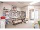 Well-stocked library with rows of bookshelves and comfortable seating, perfect for reading at 2123 Lynx Run, North Port, FL 34288