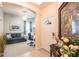 Cozy living room with tiled floors and an adjacent seating area at 2123 Lynx Run, North Port, FL 34288