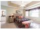 Inviting main bedroom with tray ceilings, and ensuite bathroom at 2123 Lynx Run, North Port, FL 34288