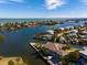 Picturesque coastal community with stunning waterfront homes, lush landscapes, and sparkling waterways at 242 Oak Ave, Anna Maria, FL 34216