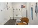Dedicated pet grooming area with utility sink, grooming table and space for pet supplies at 242 Oak Ave, Anna Maria, FL 34216
