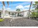 Attractive home featuring a brick patio area, perfect for outdoor seating and relaxing at 2427 Tulip St, Sarasota, FL 34239