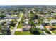 Aerial view of a charming home in a tranquil neighborhood setting at 2640 Geneva Rd, Venice, FL 34293