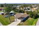 Beautiful home featuring a screened-in pool and a well-manicured lawn at 2640 Geneva Rd, Venice, FL 34293